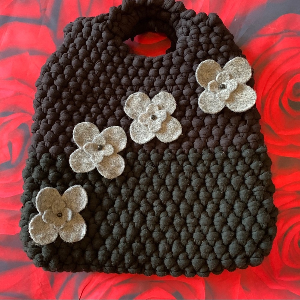 Hand made in Italy woven black purse